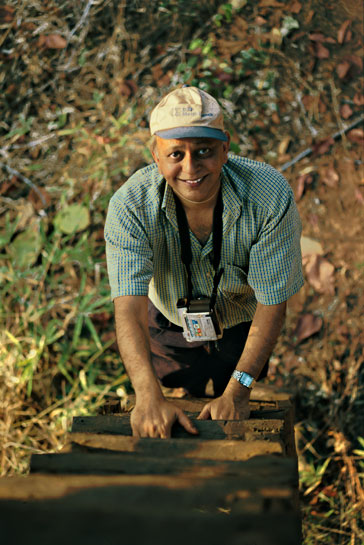 Hemendra Kothari climbing into a watchtower at the Tadoba Tiger Reserve. Representative of a new breed of wildlife protectors, he is attempting to build bridges between the government, the corporate sector and wildlife conservationists.